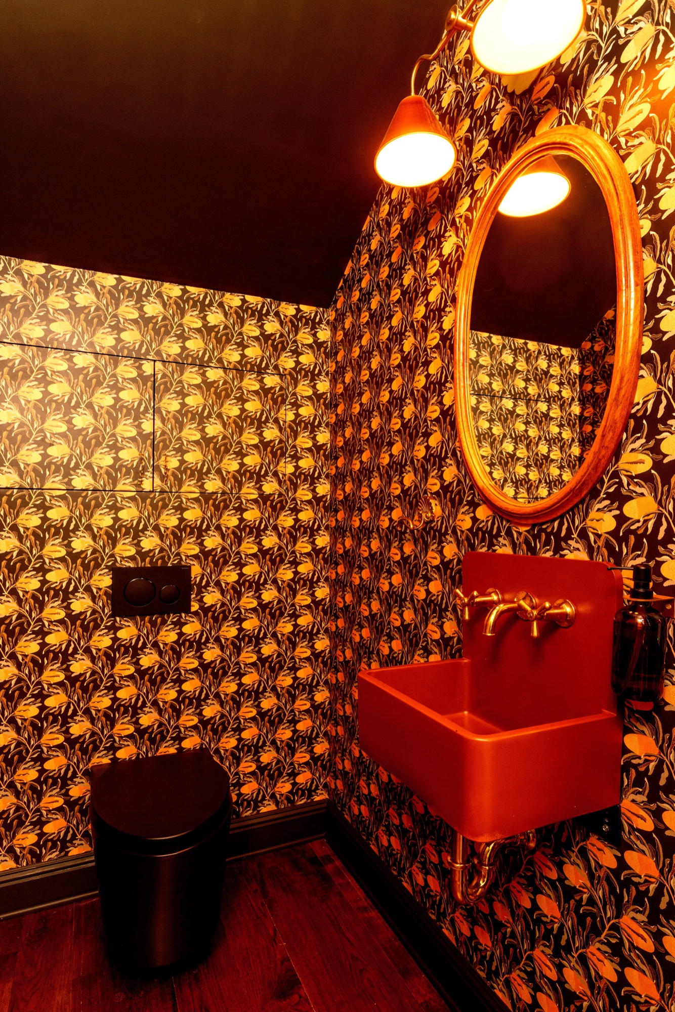 Custom powder room with floral wallcovering by M2